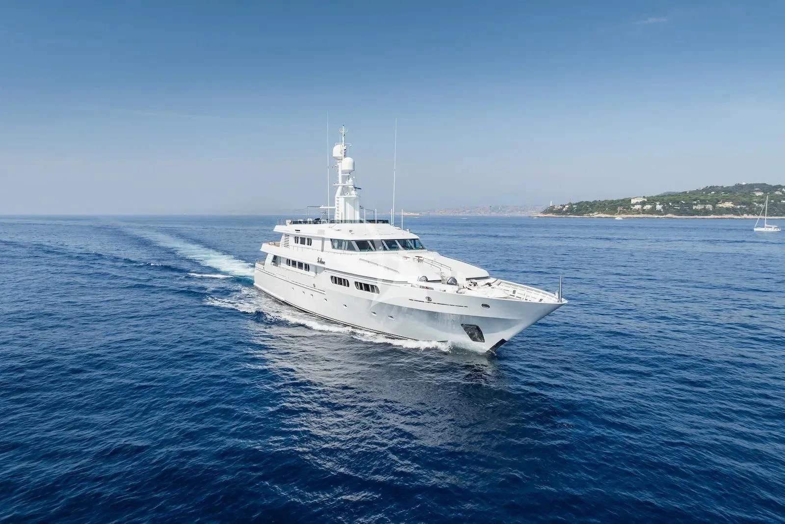 a white boat in the water aboard TE MANU Yacht for Charter