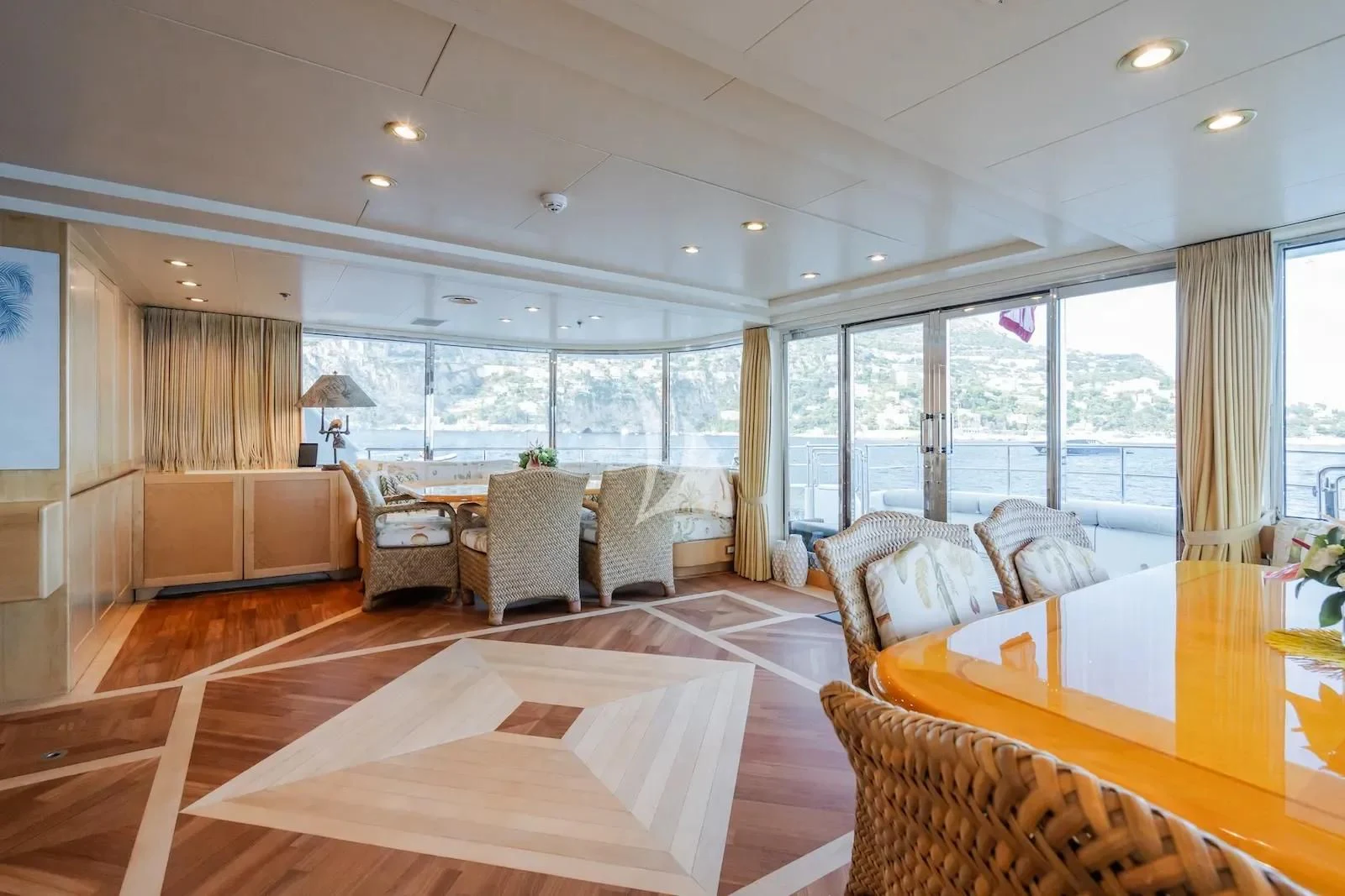 a living room with a large window aboard TE MANU Yacht for Charter