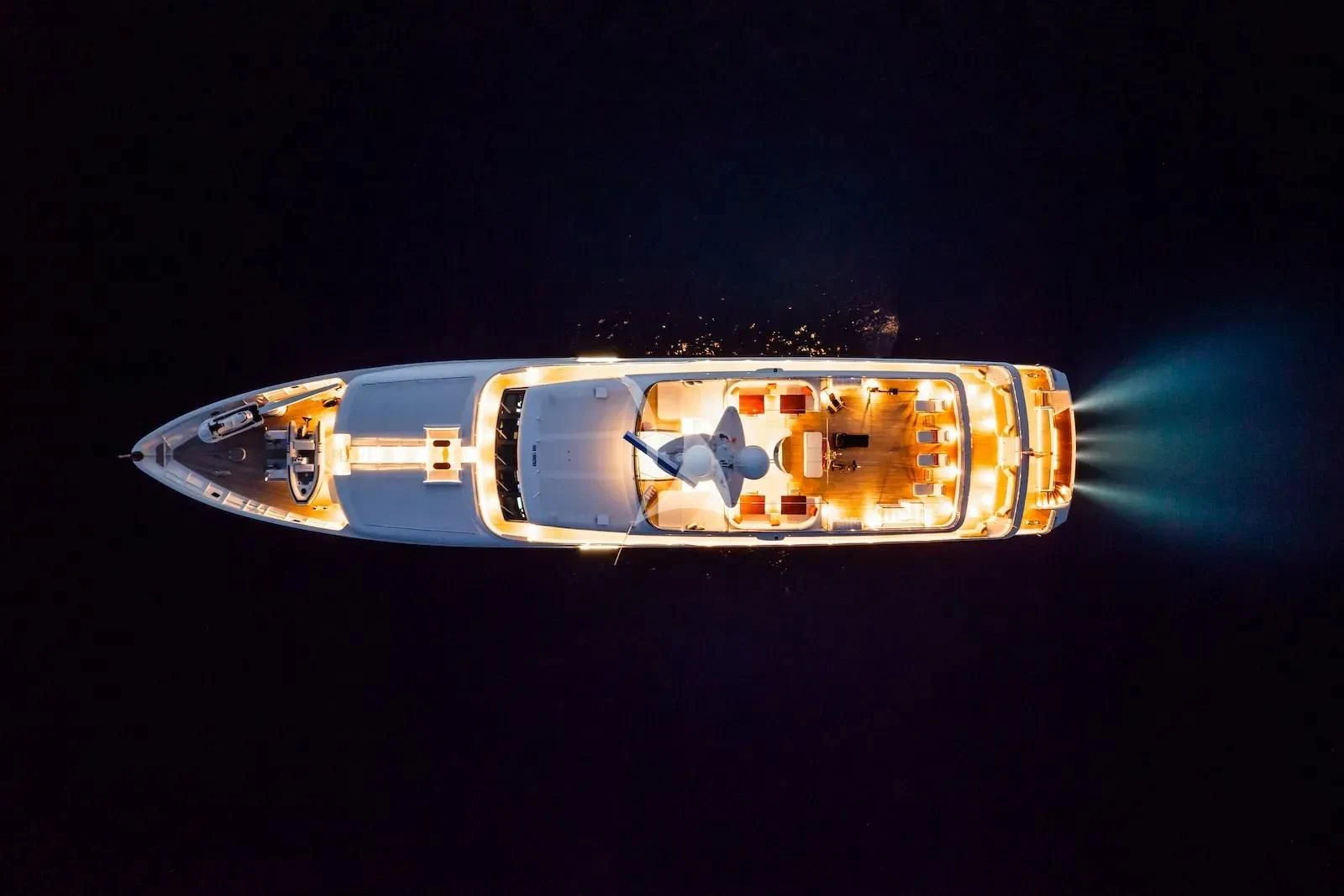 a gold and silver lighter aboard TE MANU Yacht for Charter