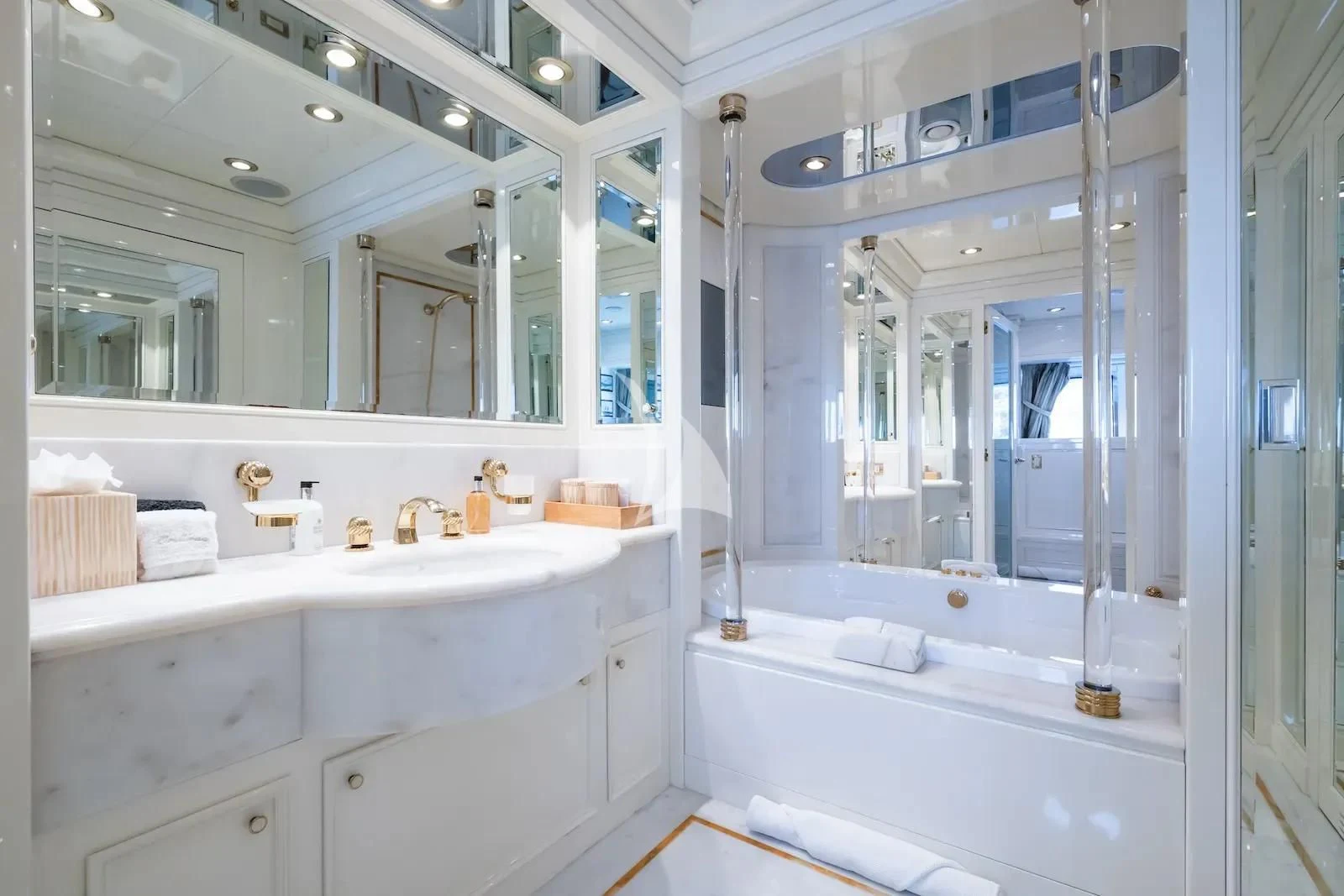 a bathroom with a large mirror aboard TE MANU Yacht for Charter