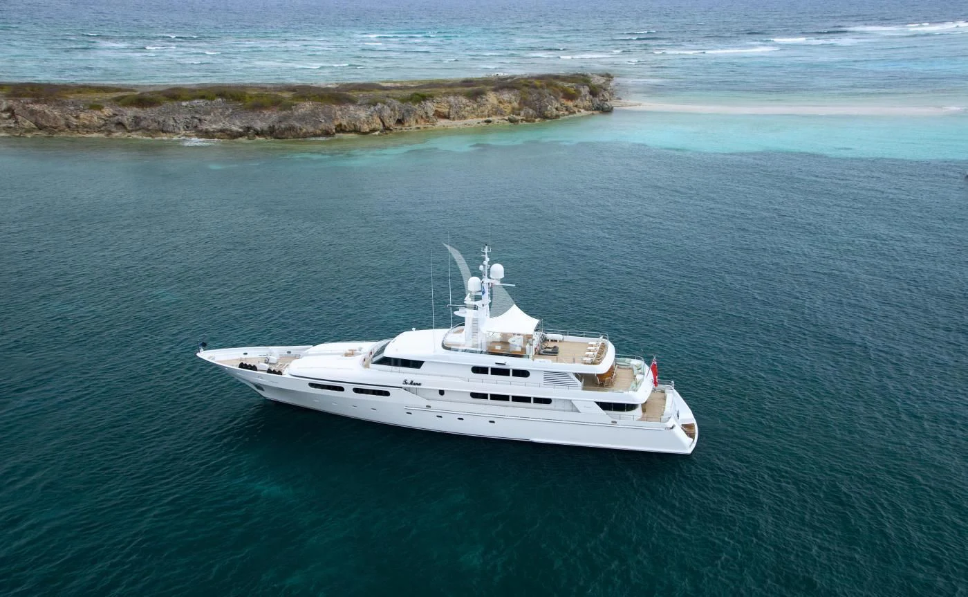 a white boat in the water aboard TE MANU Yacht for Charter