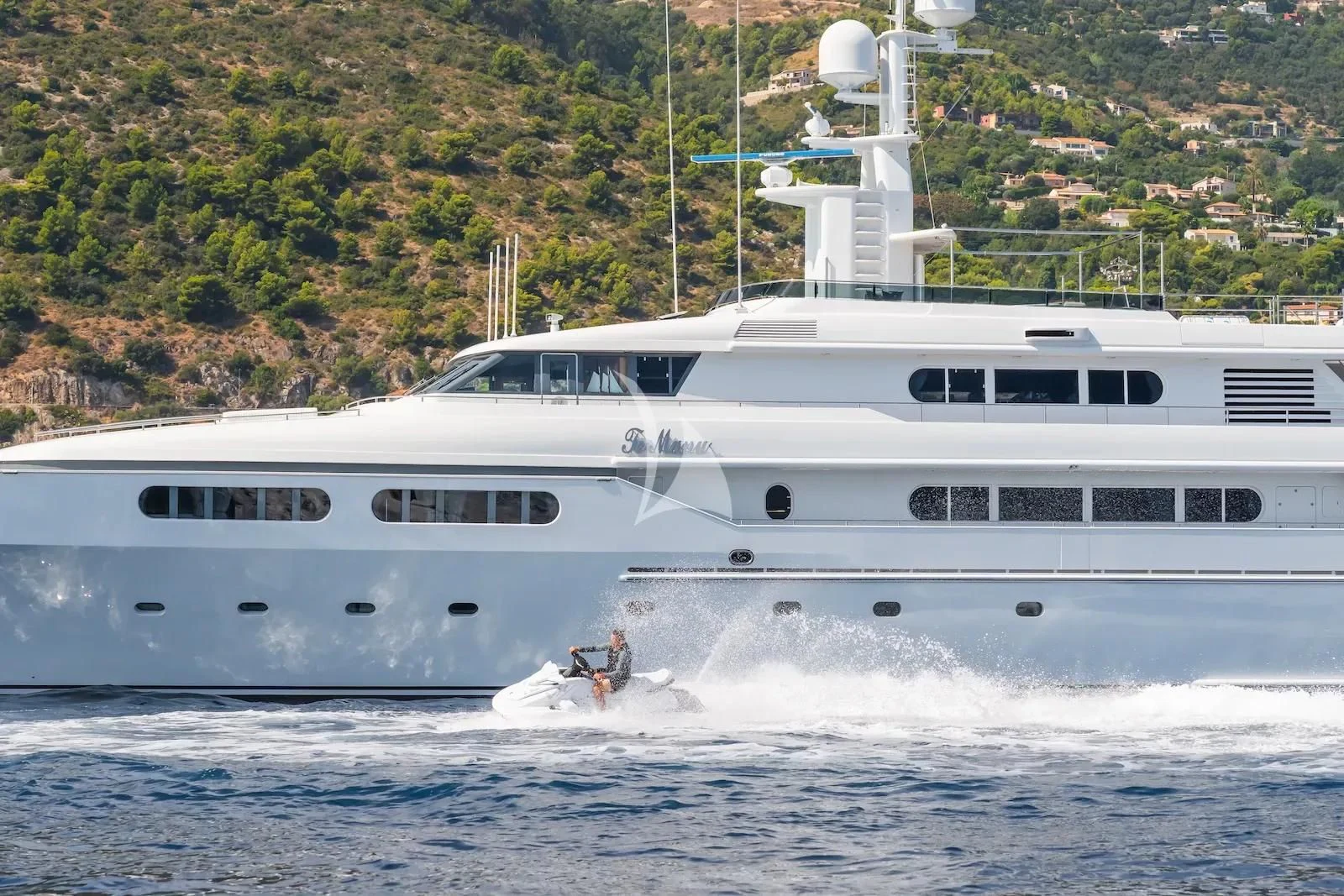 a person on a jet ski aboard TE MANU Yacht for Charter
