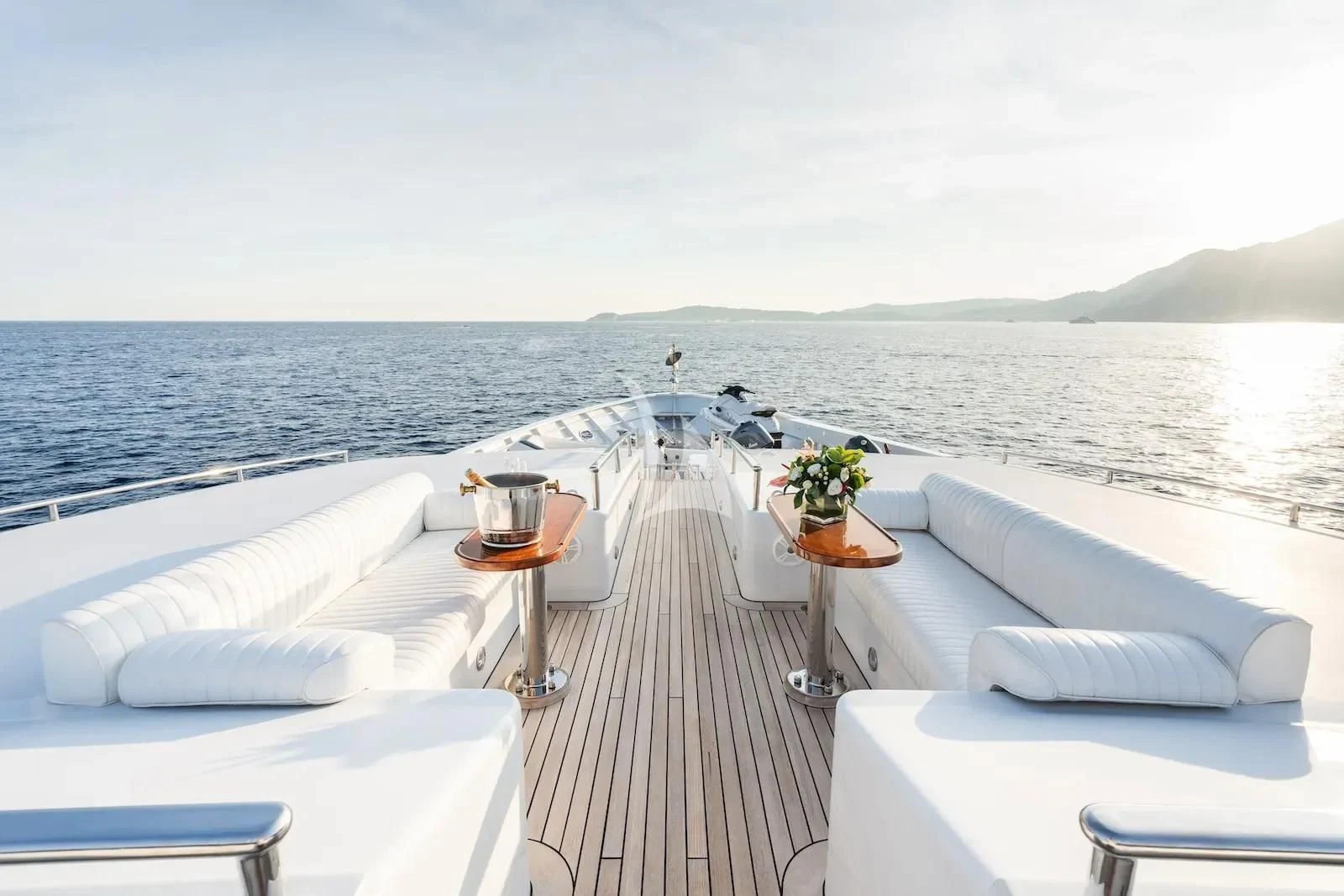 a room with a table and chairs on it aboard TE MANU Yacht for Charter