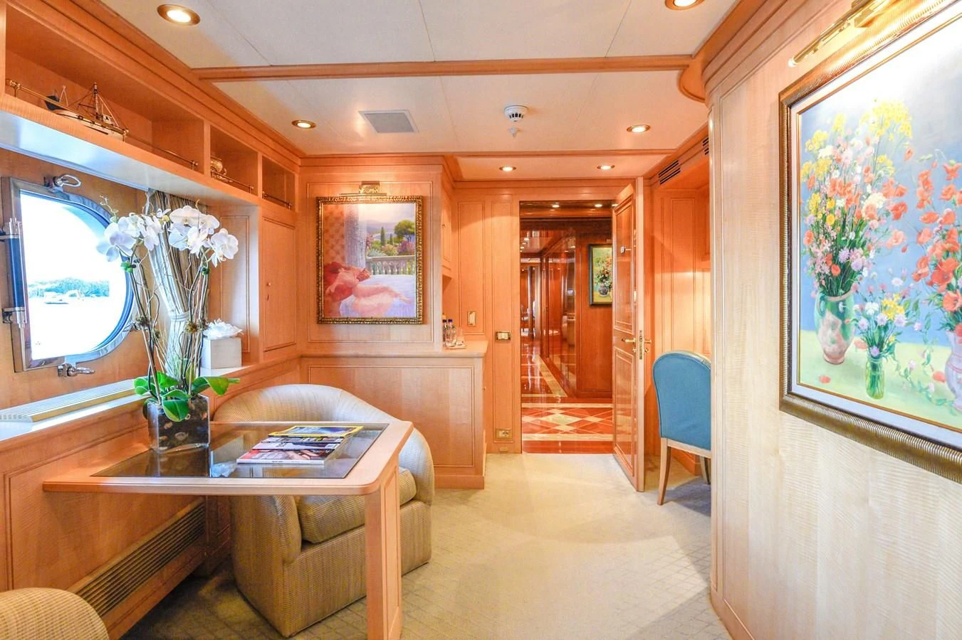 a living room with a table and chairs aboard TE MANU Yacht for Charter