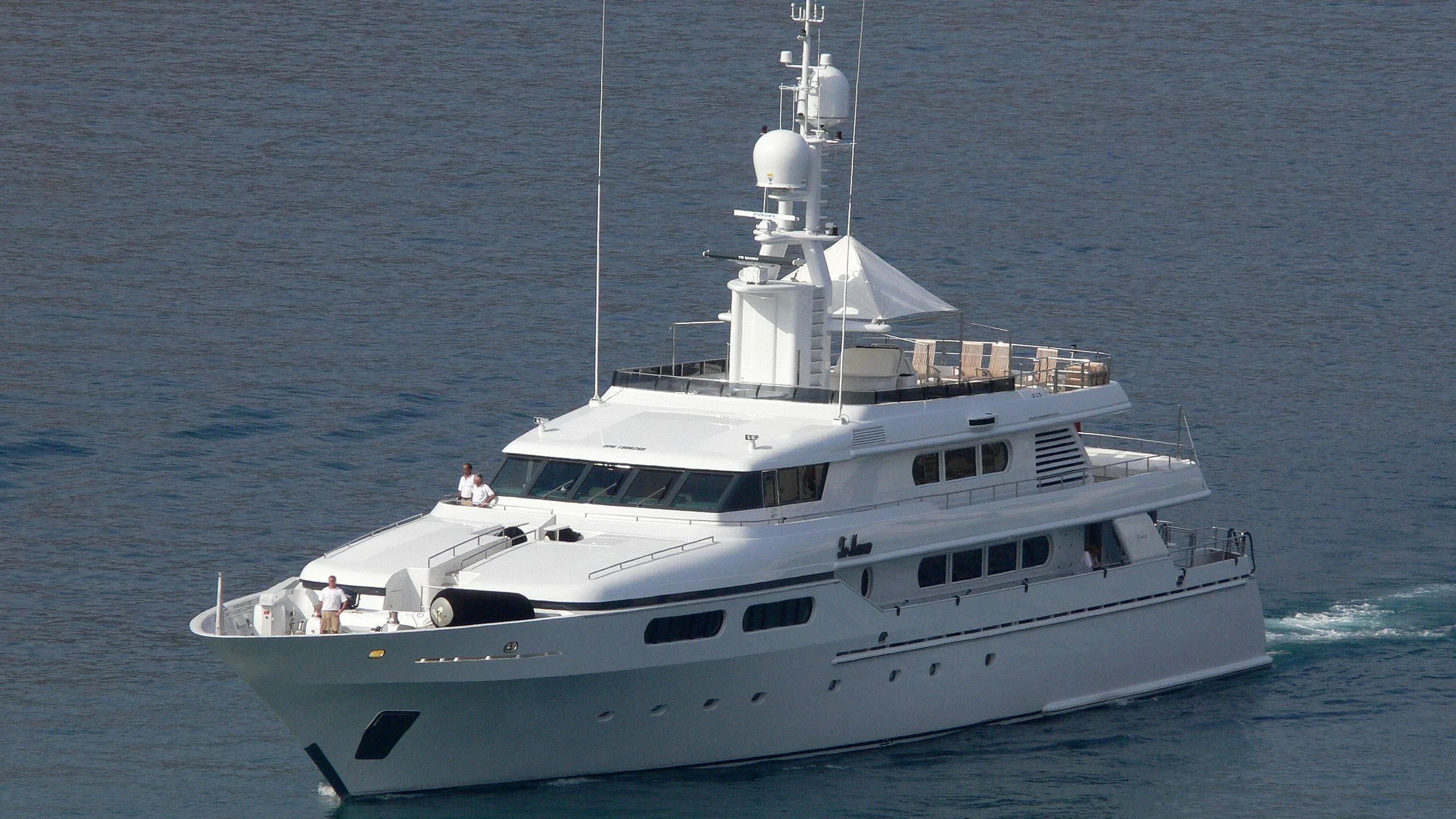 a white boat in the water aboard TE MANU Yacht for Charter
