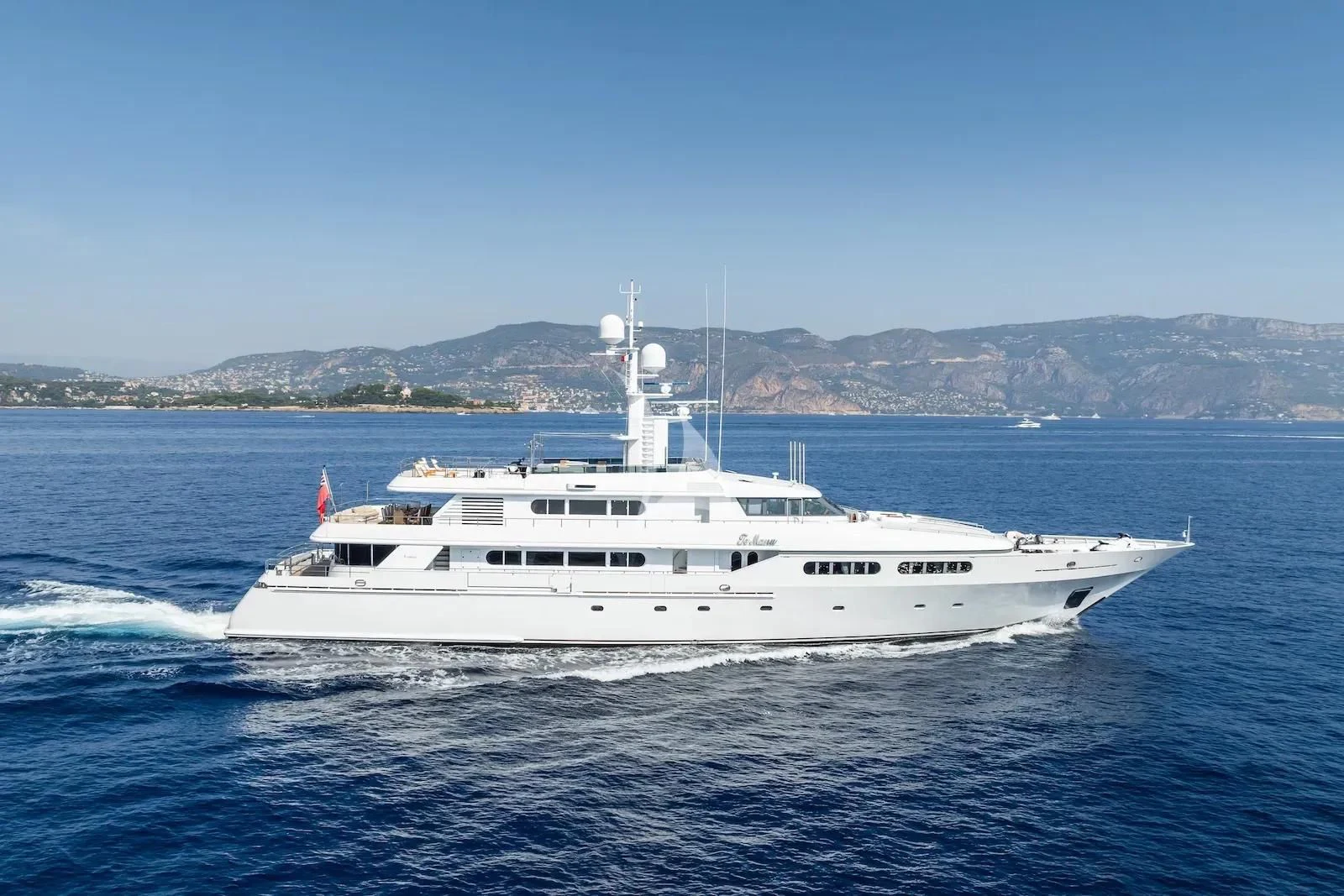 a white boat on the water aboard TE MANU Yacht for Charter