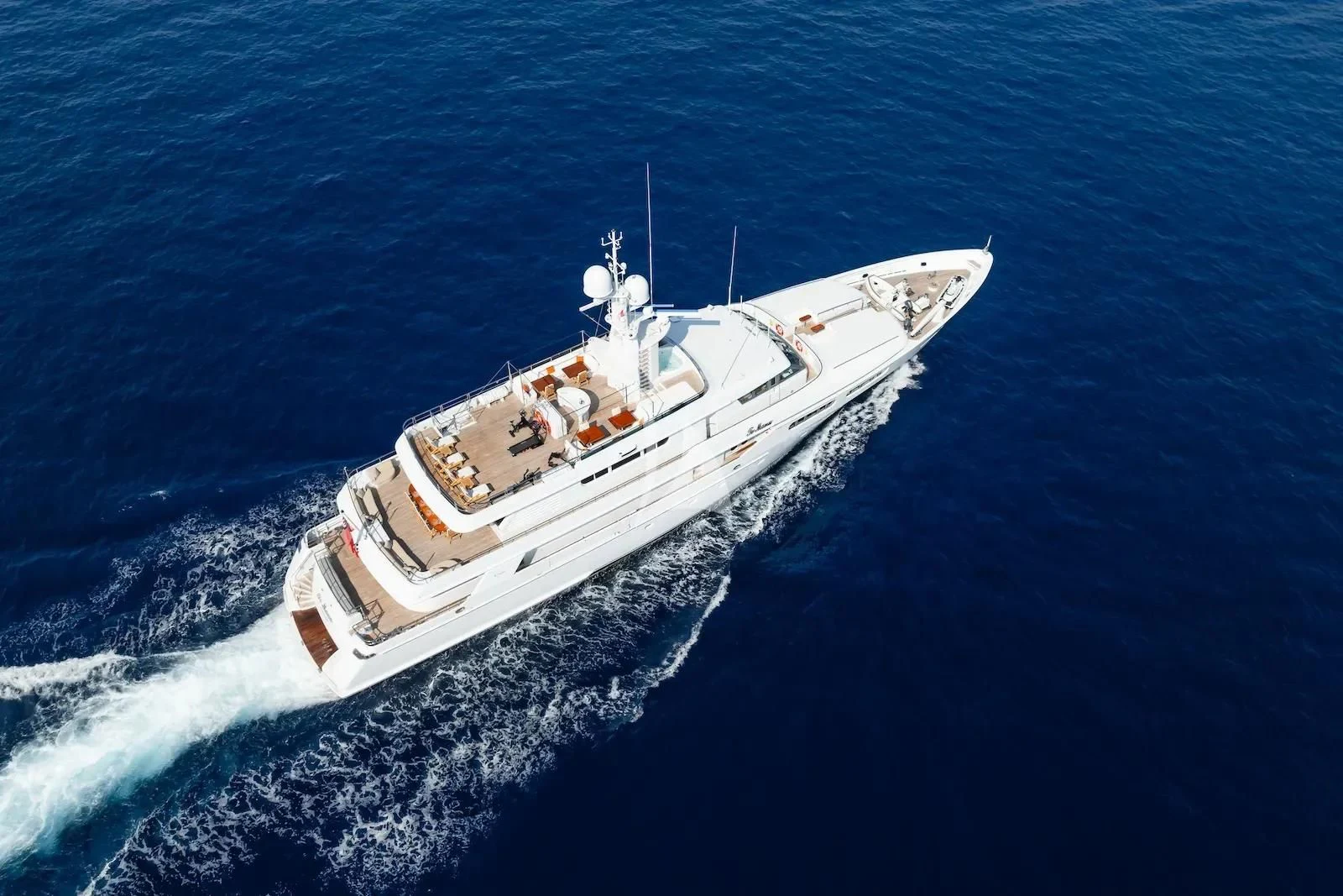 a white boat in the water aboard TE MANU Yacht for Charter