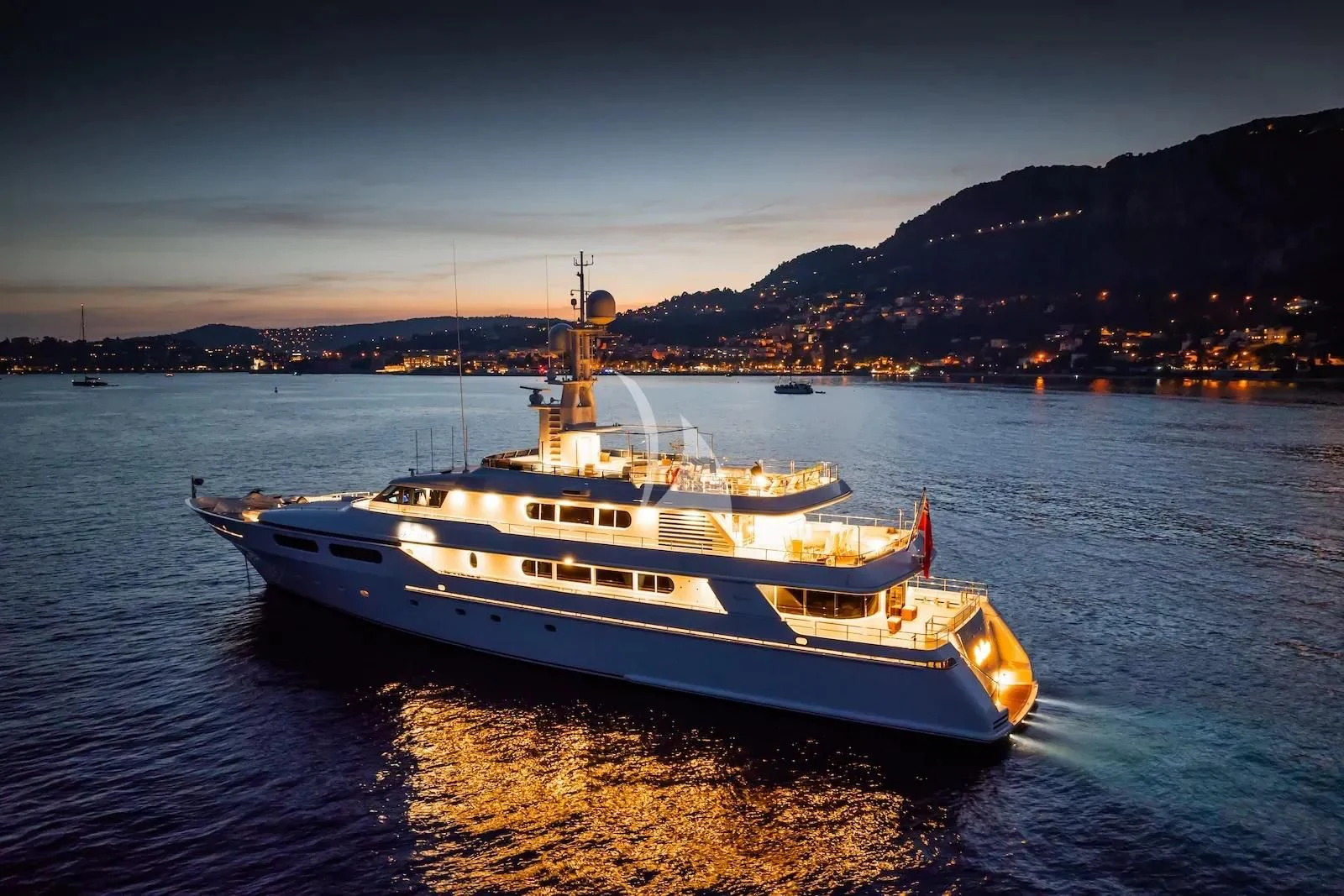 a large white boat on the water aboard TE MANU Yacht for Charter