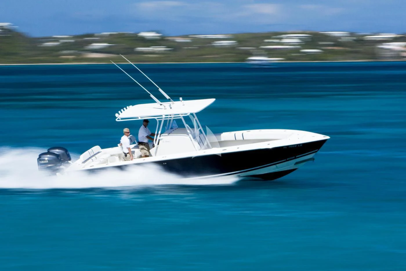 a couple of people on a boat aboard TE MANU Yacht for Charter