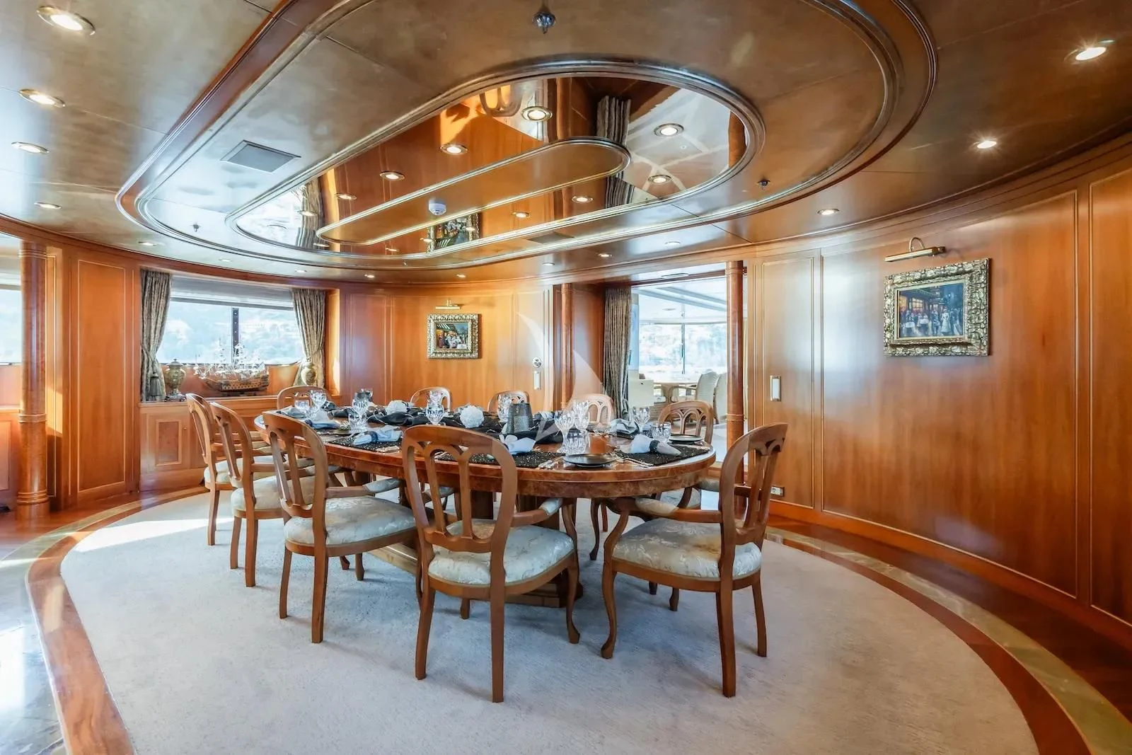 a dining room table set for a meal aboard TE MANU Yacht for Charter