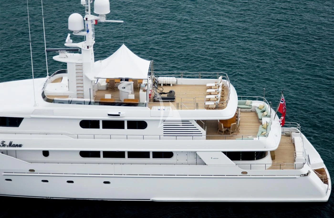 a white yacht on the water aboard TE MANU Yacht for Charter