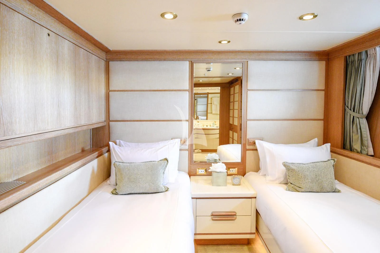 a room with two beds aboard TE MANU Yacht for Charter