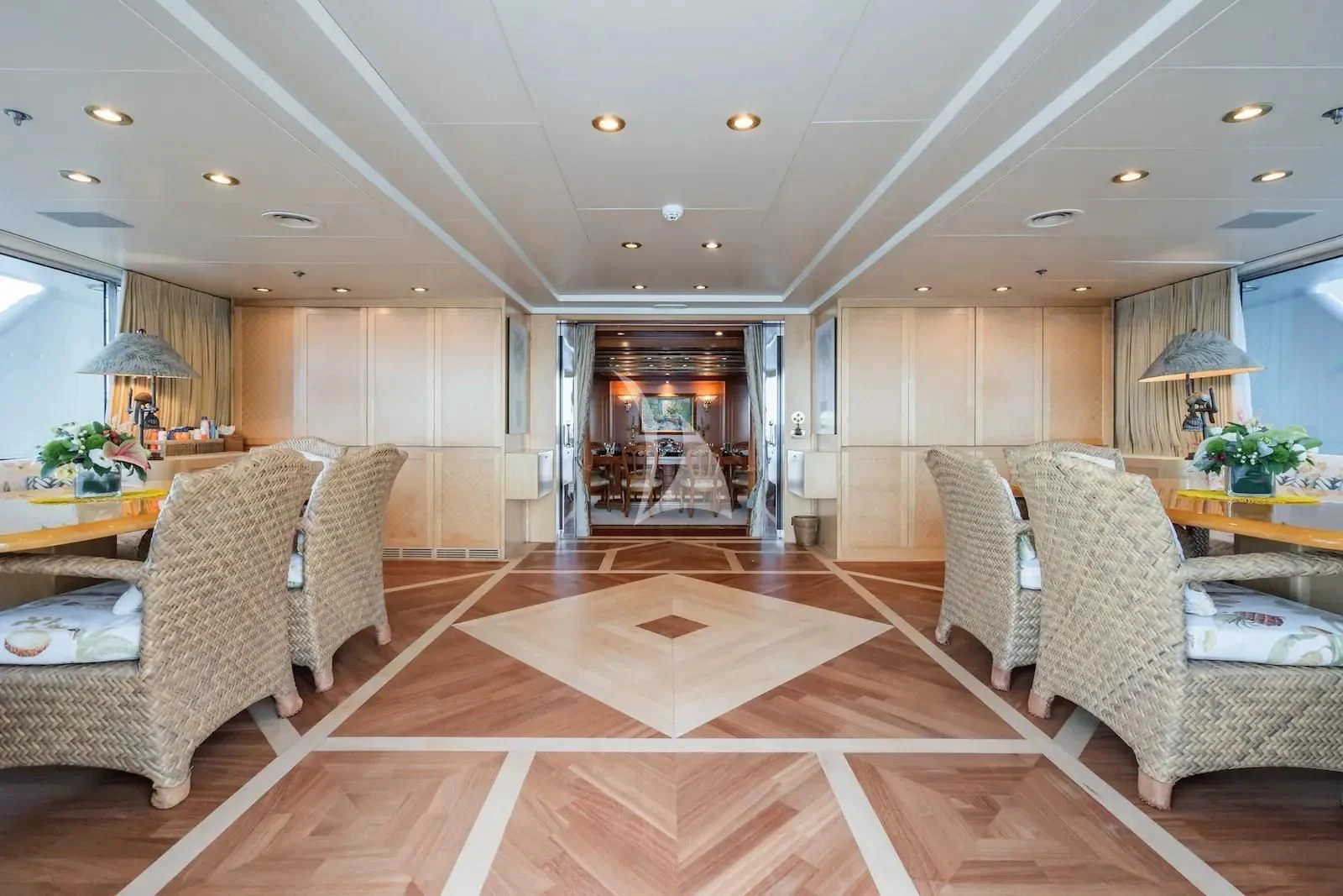 a large living room with a tile floor aboard TE MANU Yacht for Charter