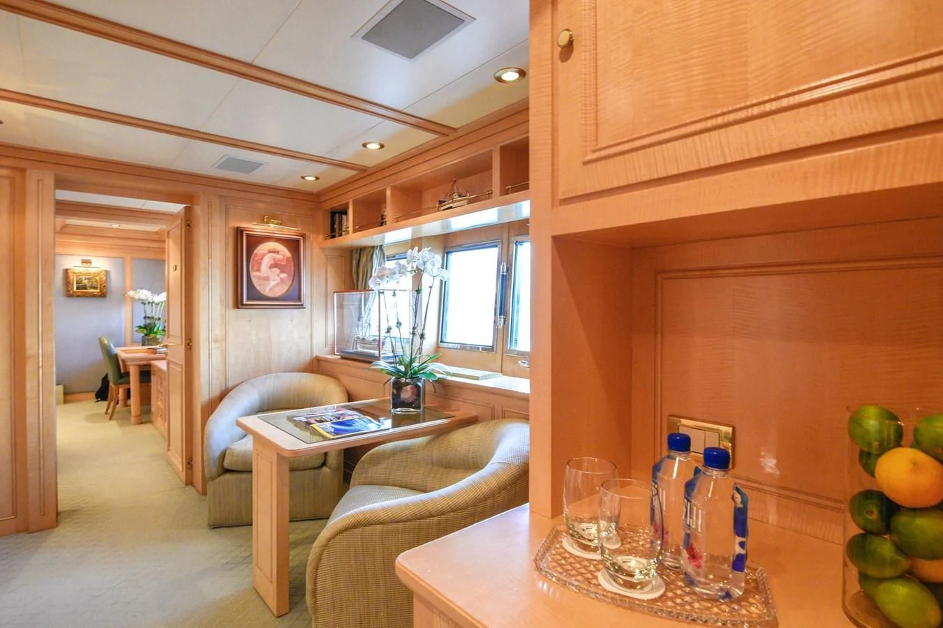 a living room with a table and chairs aboard TE MANU Yacht for Charter
