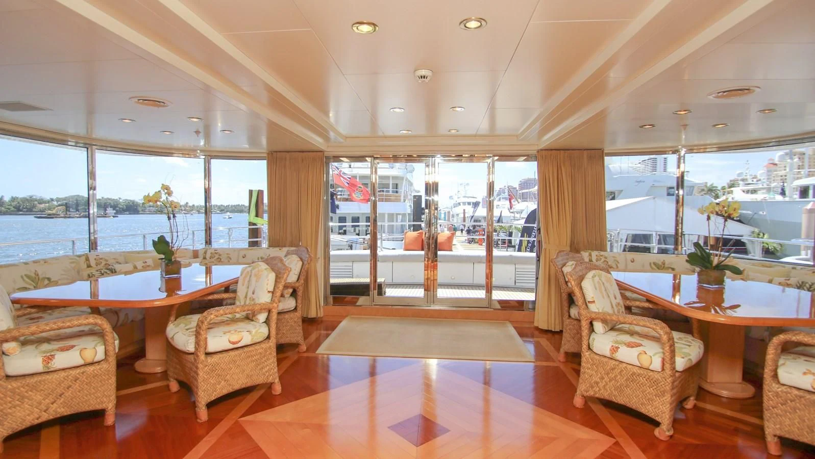 a living room with a table and chairs aboard TE MANU Yacht for Charter