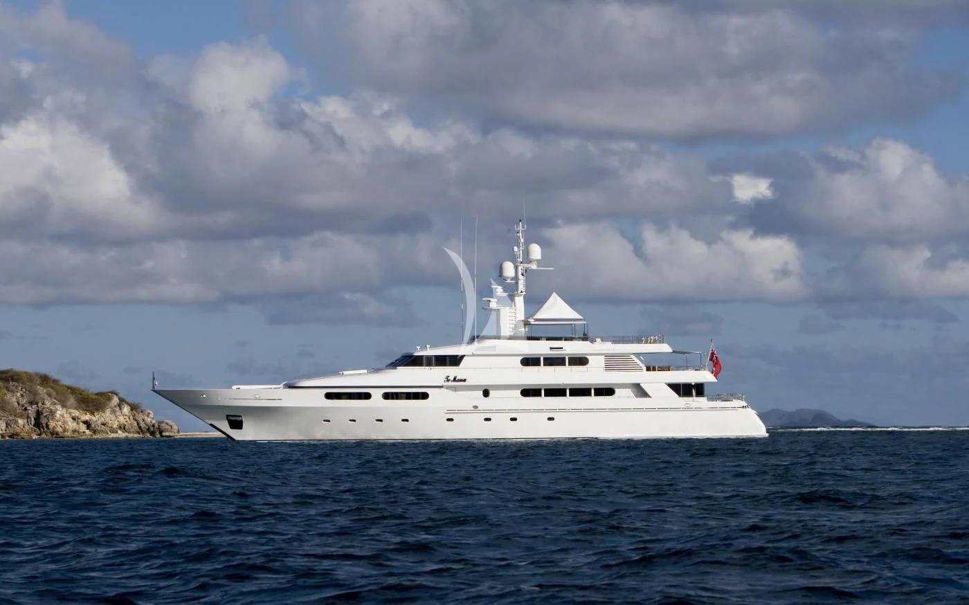 a white boat in the water aboard TE MANU Yacht for Charter