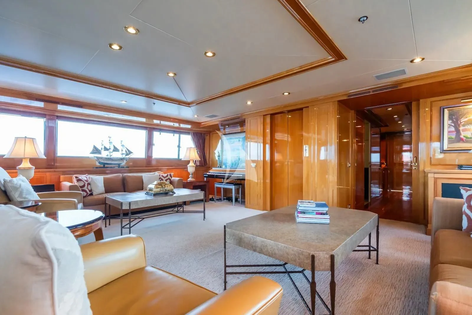 a living room with a table and chairs aboard TE MANU Yacht for Charter