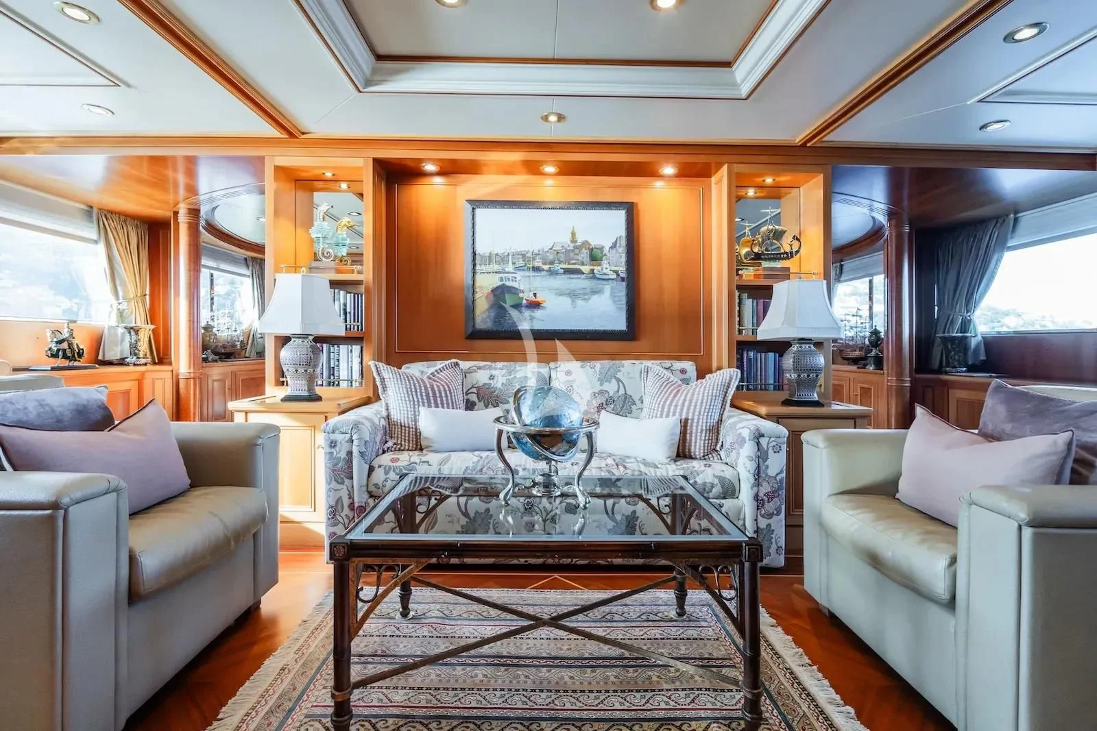 a living room with a large sofa aboard TE MANU Yacht for Charter