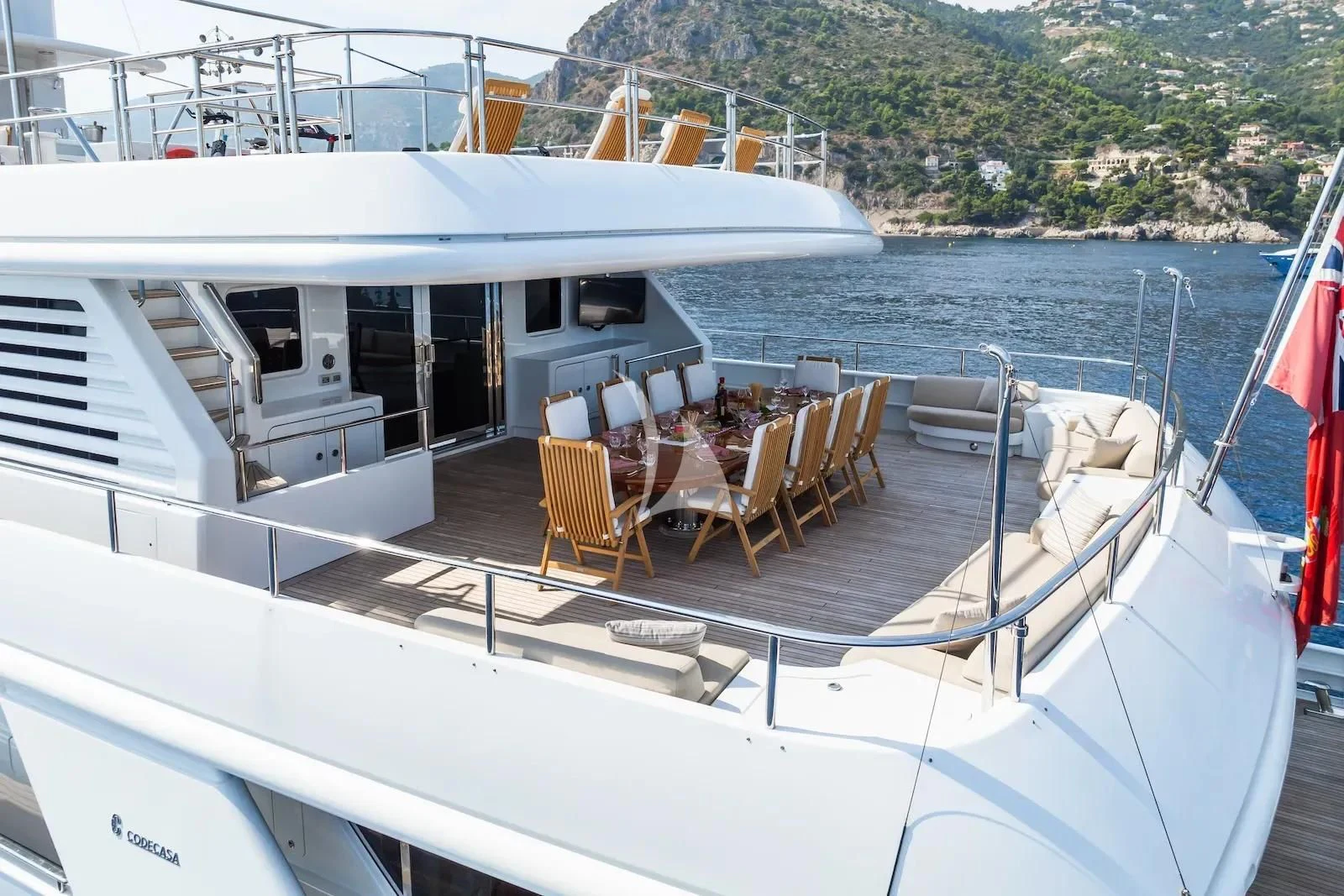 a boat with chairs on the deck aboard TE MANU Yacht for Charter