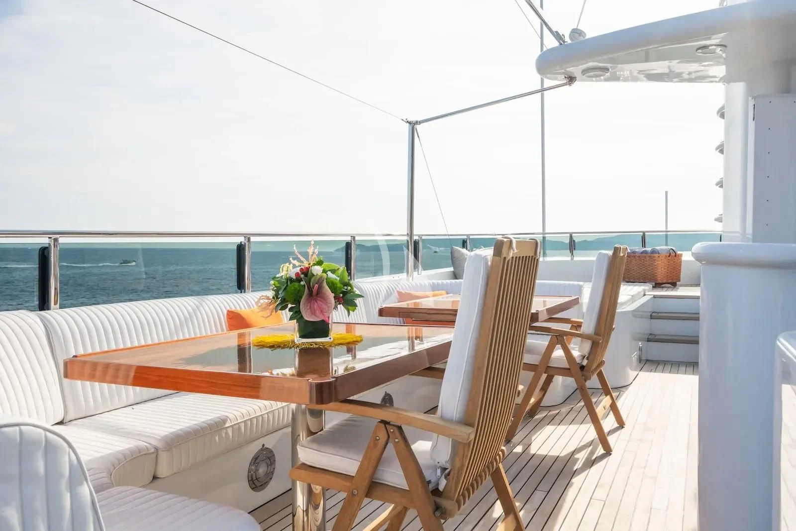 a room with chairs and tables aboard TE MANU Yacht for Charter