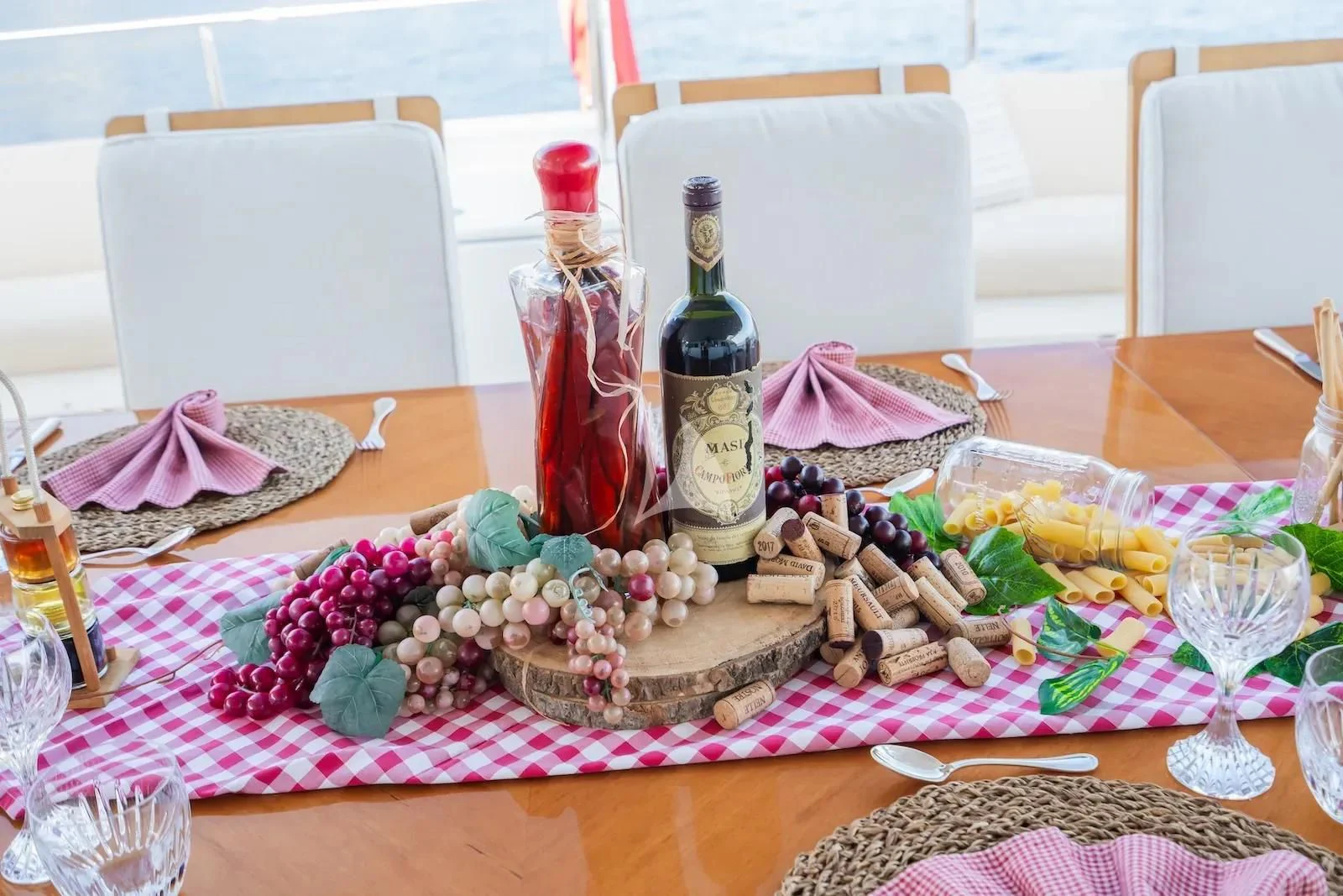 a table with food and bottles aboard TE MANU Yacht for Charter