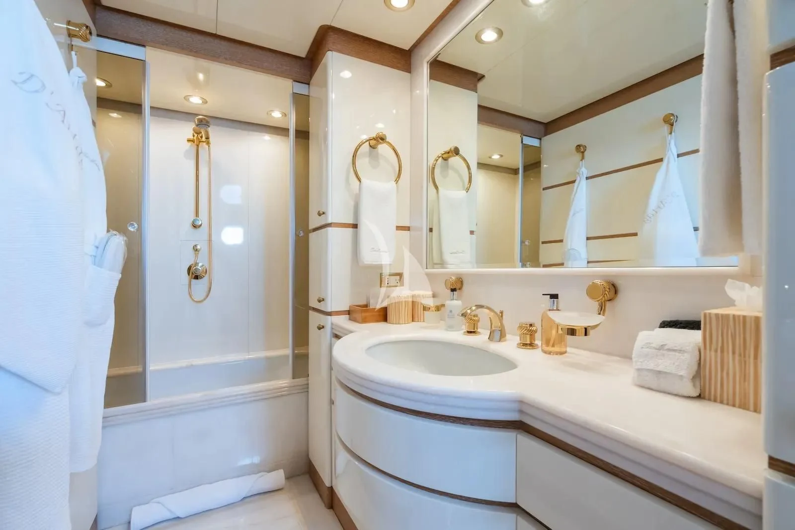 a bathroom with a sink and a shower aboard TE MANU Yacht for Charter