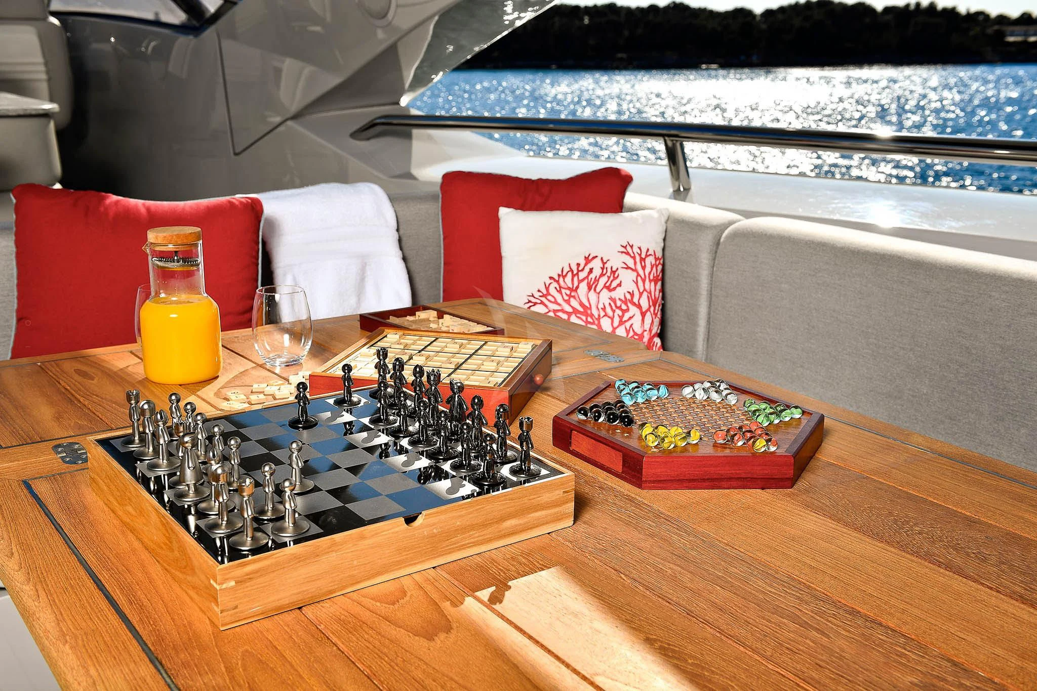 a board game on a boat aboard TENACITY Yacht for Sale