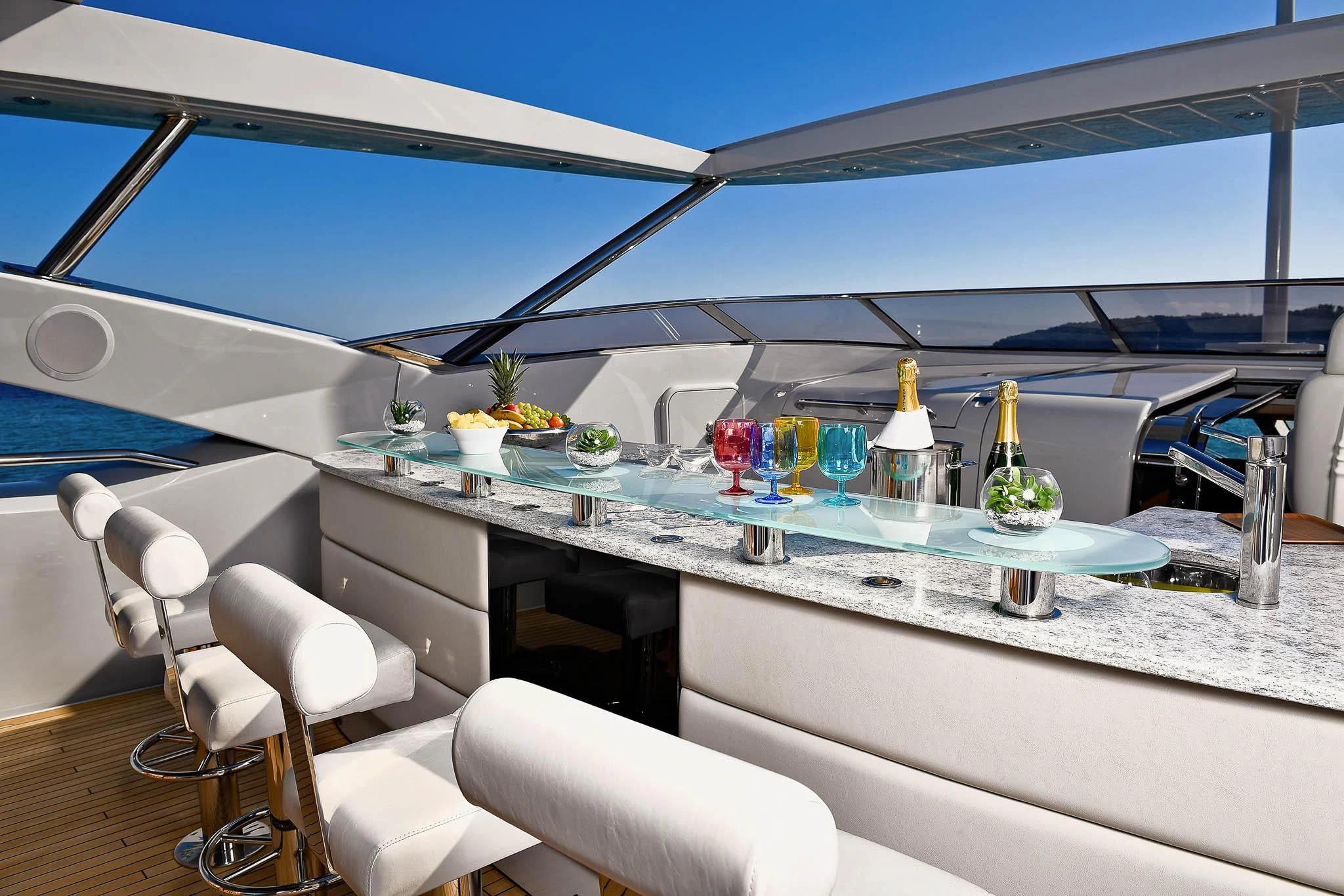 a room with a table and chairs aboard TENACITY Yacht for Sale