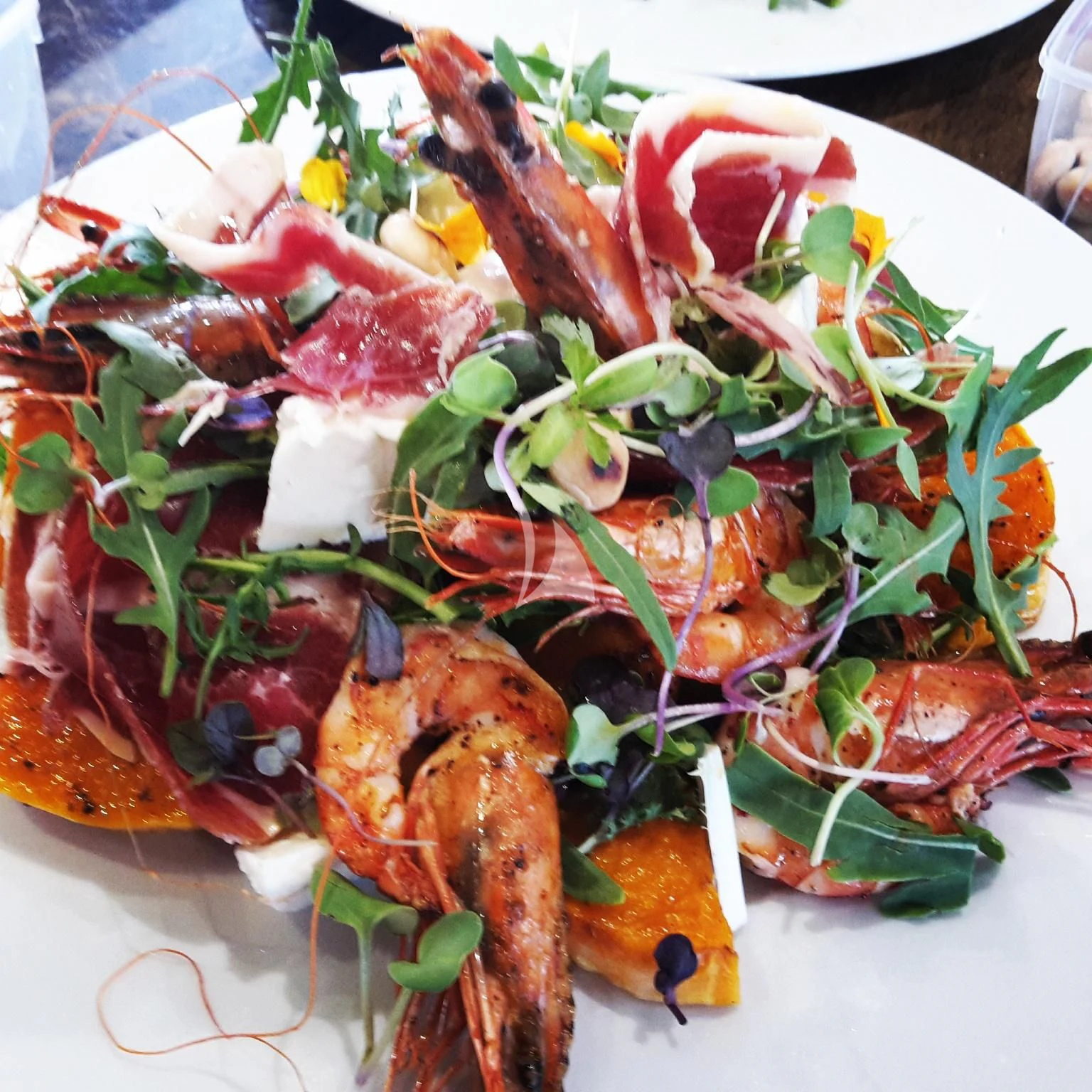 a plate of food aboard TENACITY Yacht for Sale