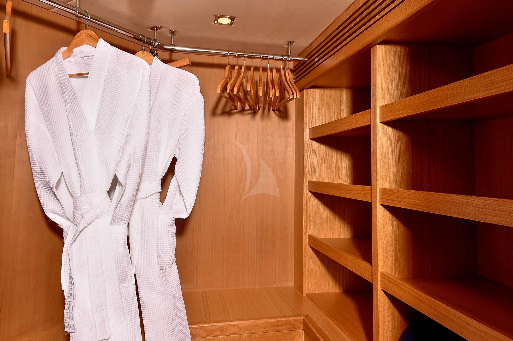 a white shirt from a bar aboard TENACITY Yacht for Sale