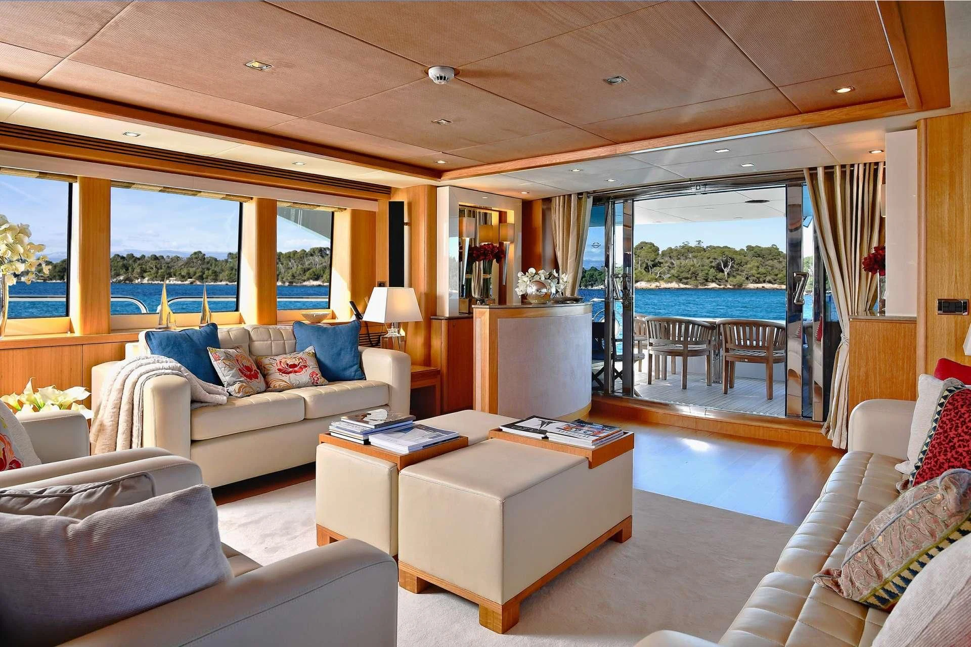 a living room with a large window aboard TENACITY Yacht for Sale