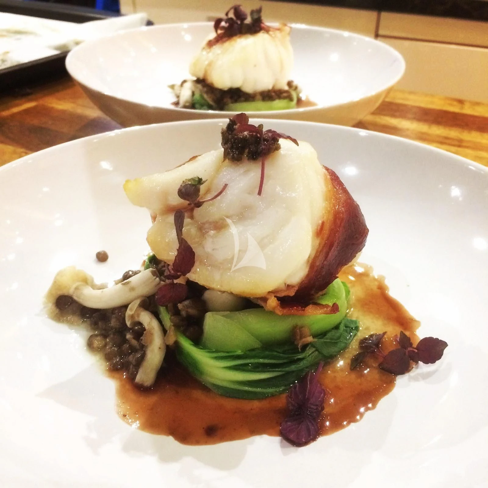 a plate of food aboard TENACITY Yacht for Sale