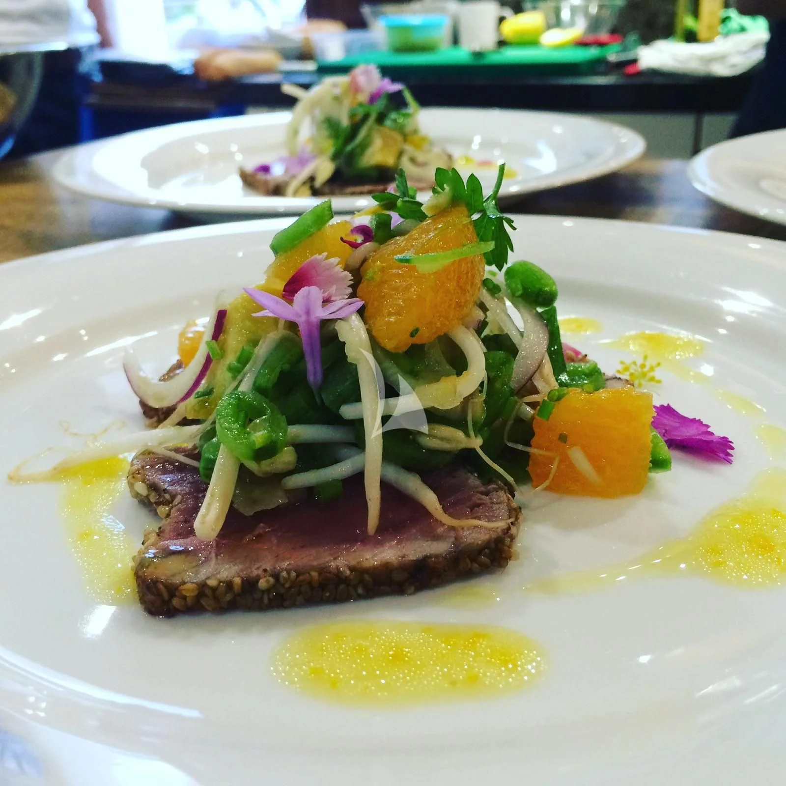 a plate of food aboard TENACITY Yacht for Sale