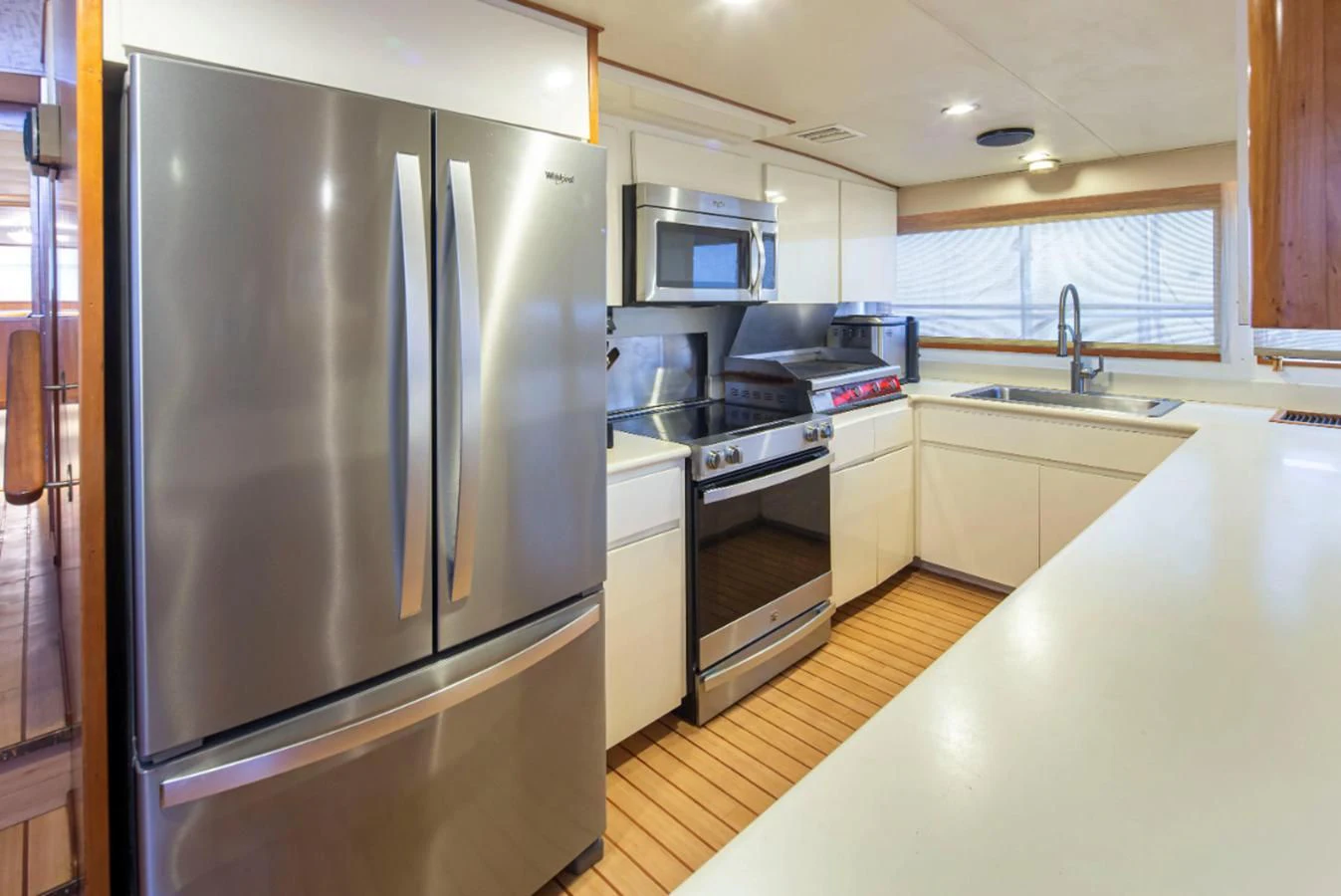 a kitchen with stainless steel appliances aboard GOLDEN EAGLE Yacht for Sale
