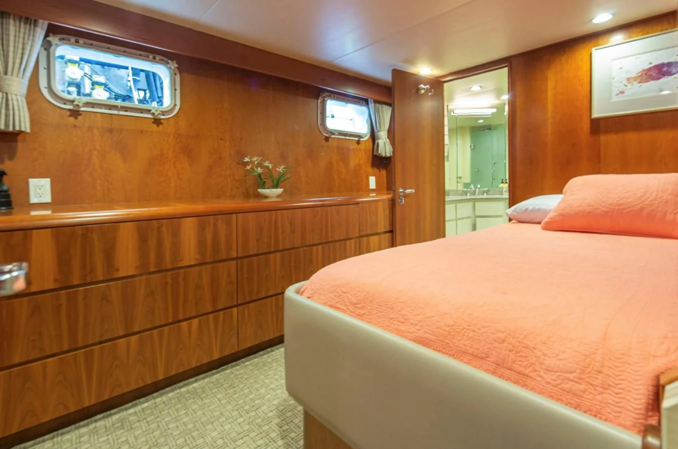a room with a bed and a window aboard GOLDEN EAGLE Yacht for Sale