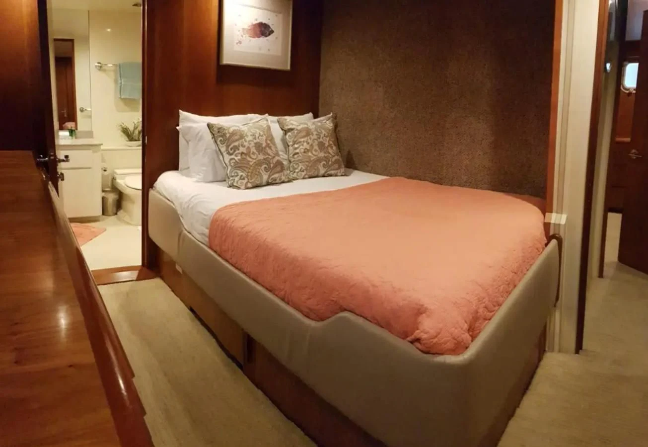 a bed in a room aboard GOLDEN EAGLE Yacht for Sale