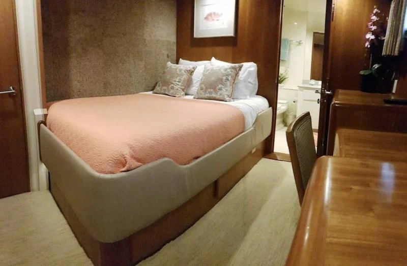 a bed in a room aboard GOLDEN EAGLE Yacht for Sale