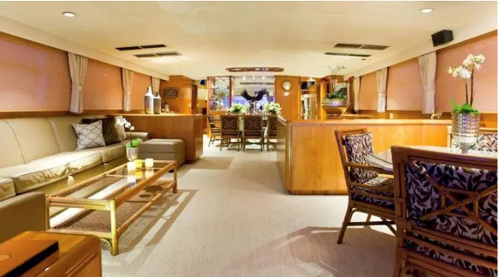 a living room with a couch and a coffee table aboard GOLDEN EAGLE Yacht for Sale