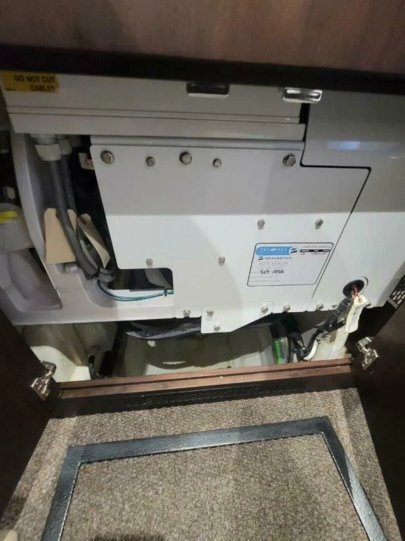 a machine with a piece of paper on the back aboard GODSPEED Yacht for Sale