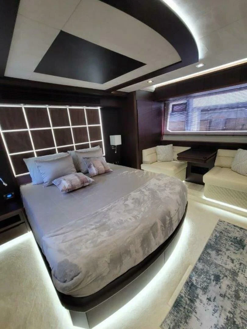 a large bed in a room aboard GODSPEED Yacht for Sale