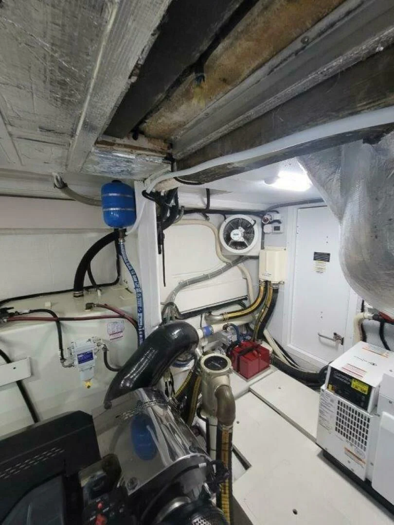 a room with a machine aboard GODSPEED Yacht for Sale