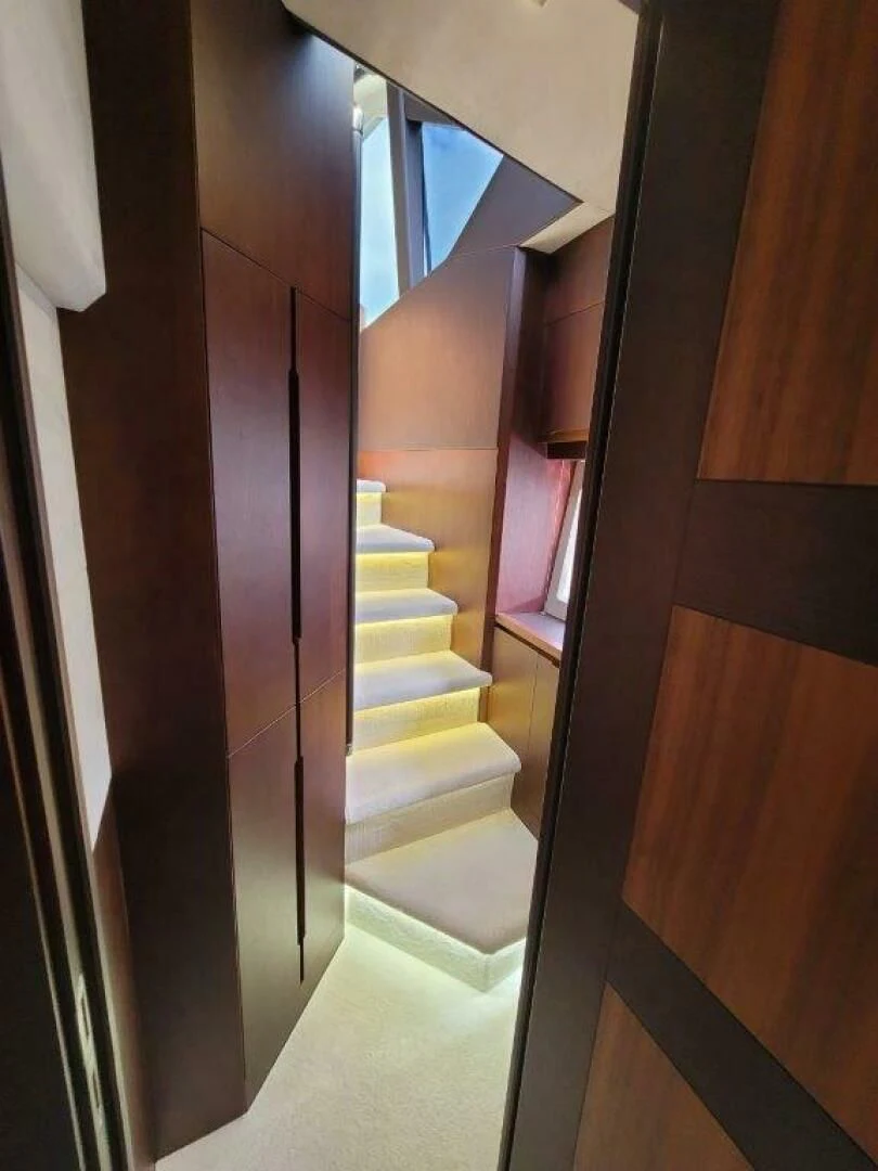 a hallway with a set of doors aboard GODSPEED Yacht for Sale