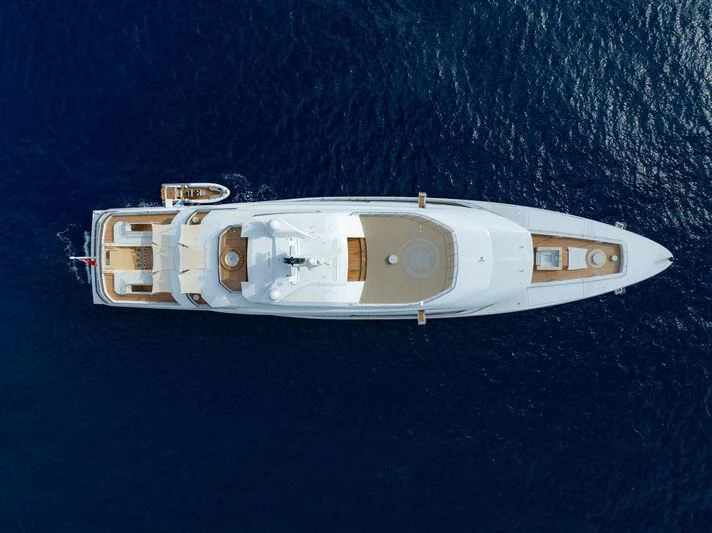 a white rectangular object with a silver center on a blue surface aboard ENERGY Yacht for Sale