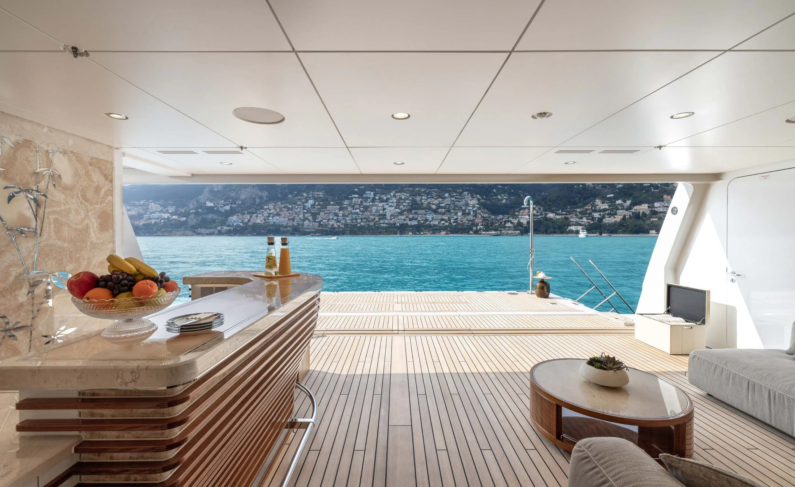 a room with a table and chairs and a view of the ocean aboard ENERGY Yacht for Sale