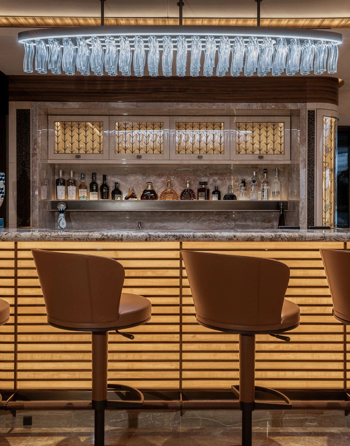 a bar with a shelf of bottles aboard ENERGY Yacht for Sale