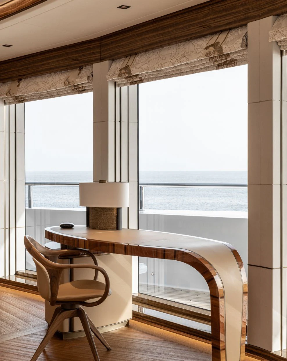 a table and chairs in a room aboard ENERGY Yacht for Sale