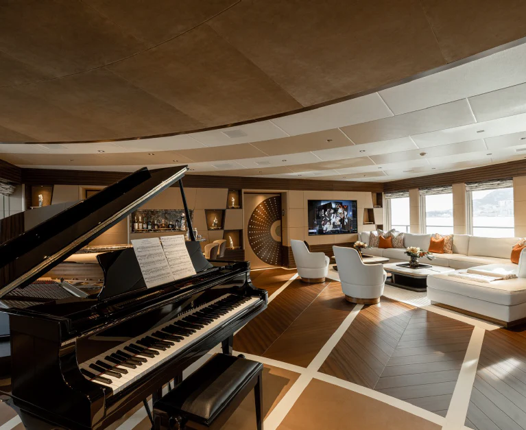 a large room with a piano aboard ENERGY Yacht for Sale