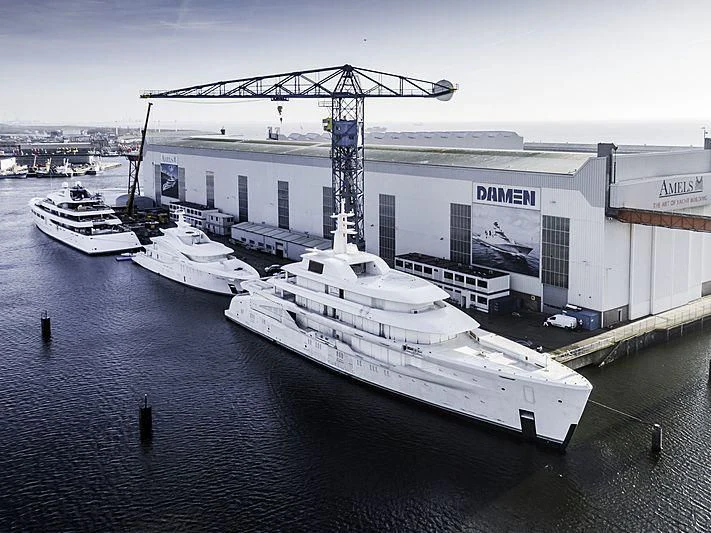 a large white ship docked aboard ENERGY Yacht for Sale