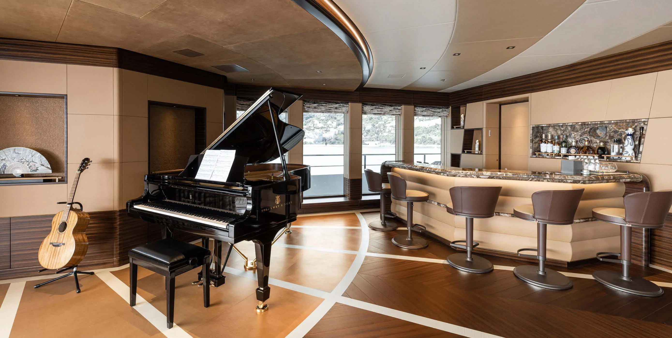 a piano in a room aboard ENERGY Yacht for Sale