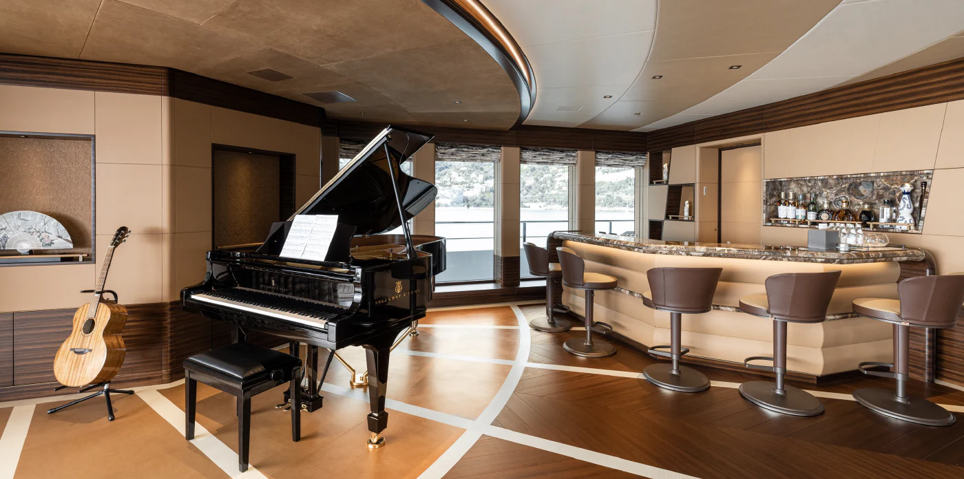 a piano in a room aboard ENERGY Yacht for Sale
